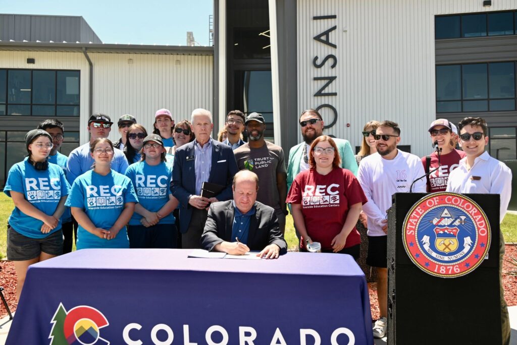Governor Polis signs HB 25-1215 at Bonsai Designs in Grand Junction