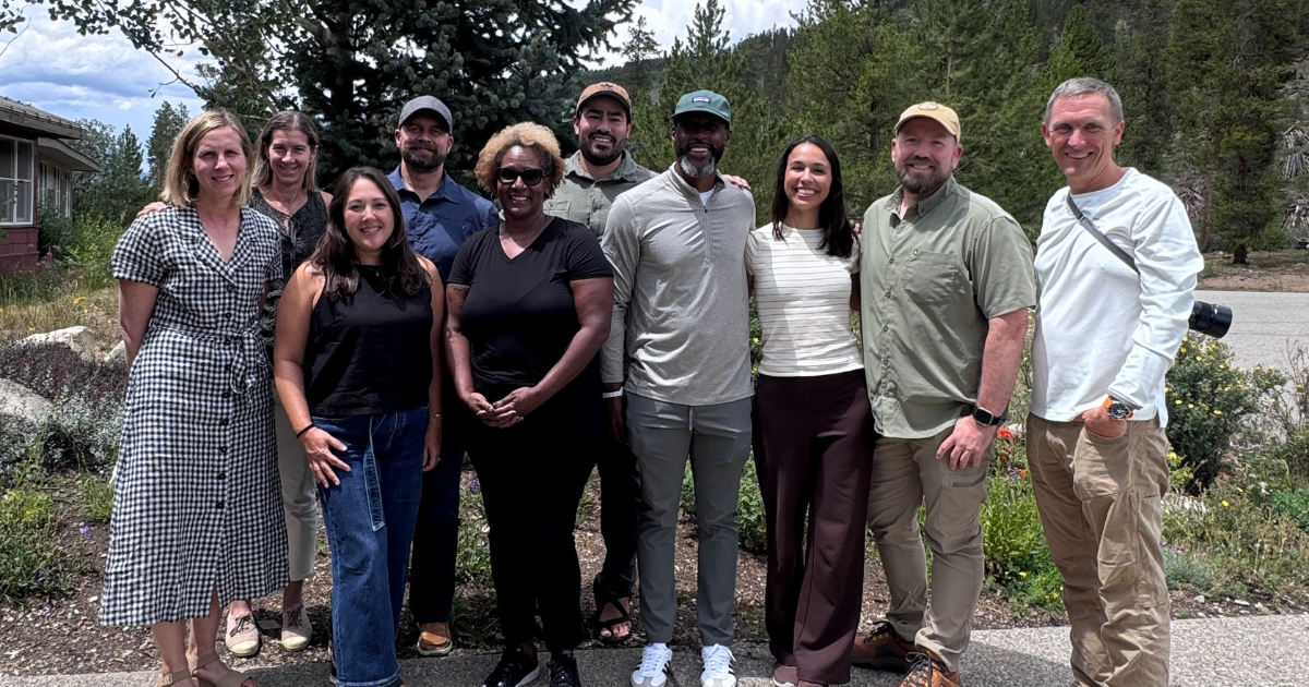 Peak Collaborative Retreat Colorado Peak Collaborative Retreat Group standing outside smiling at camera